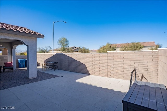 view of patio with a fenced backyard