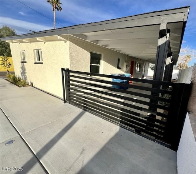 view of side of property with stucco siding