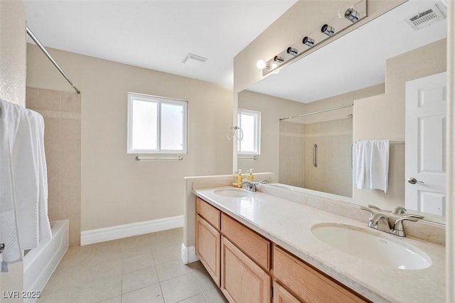 bathroom with tile patterned flooring, vanity, and shower / bathtub combination with curtain
