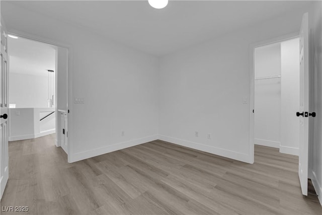 unfurnished bedroom with light hardwood / wood-style flooring