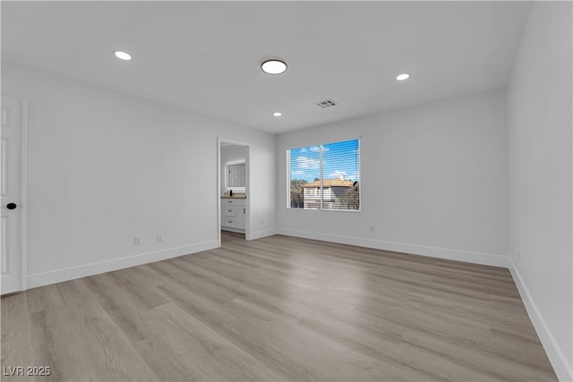 empty room with light wood-type flooring