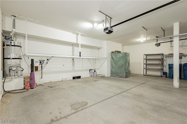 garage featuring a garage door opener and water heater