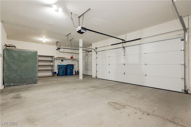 garage featuring a garage door opener