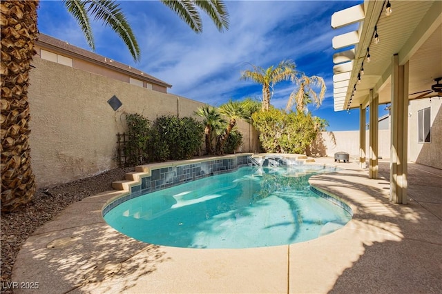 view of swimming pool with a patio