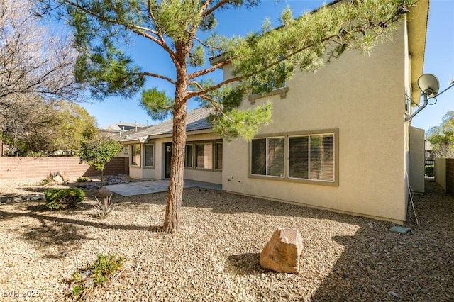 rear view of property with a patio area