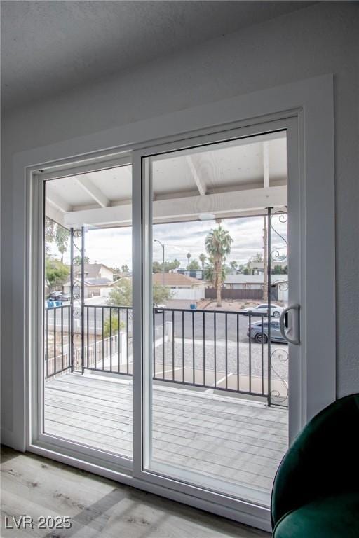 doorway to outside with light hardwood / wood-style floors