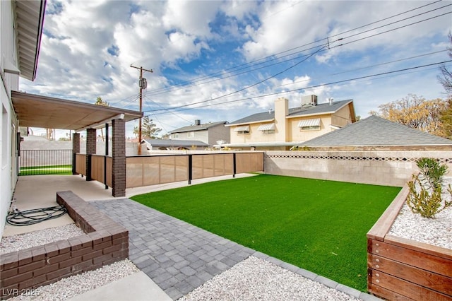 view of yard with a patio area