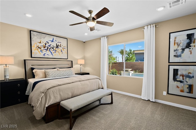 bedroom with ceiling fan and carpet flooring