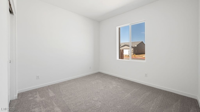 4485 E Brusca Way, Pahrump, NV 89061 - carpeted empty room featuring baseboards