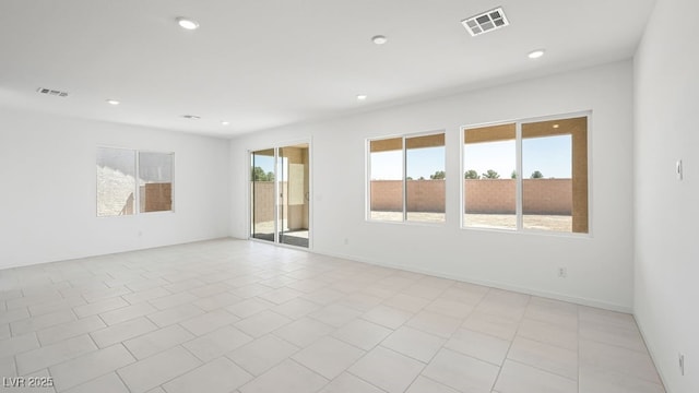 4485 E Brusca Way, Pahrump, NV 89061 - empty room featuring light tile patterned floors, visible vents, and recessed lighting