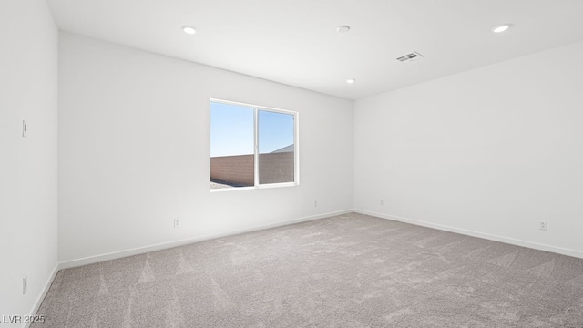 4485 E Brusca Way, Pahrump, NV 89061 - carpeted empty room featuring baseboards, visible vents, and recessed lighting