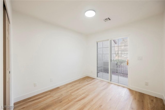 empty room with light wood-type flooring