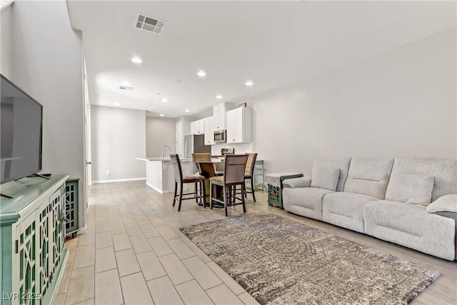 living room with light wood-type flooring