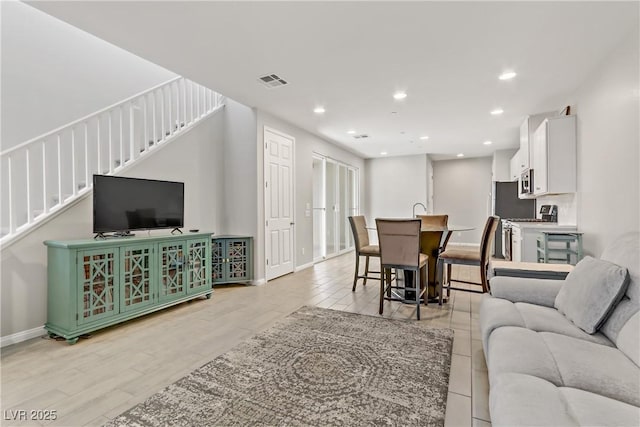 living room featuring light hardwood / wood-style flooring