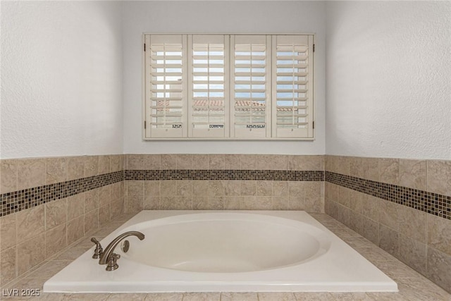 bathroom with a tub