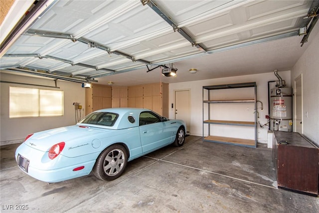 garage featuring a garage door opener and secured water heater