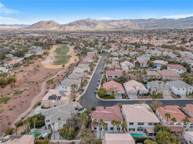 birds eye view of property featuring a mountain view