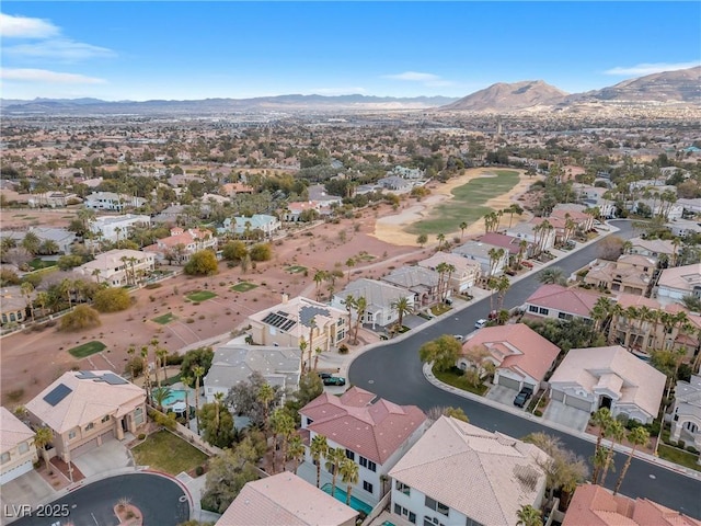 drone / aerial view featuring a mountain view