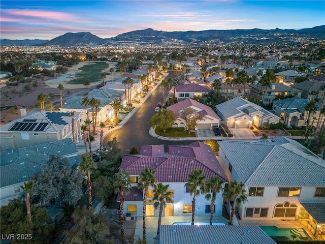 aerial view at dusk with a mountain view