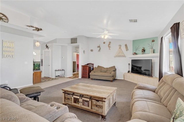 living room with carpet flooring and ceiling fan