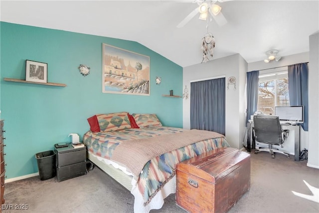 carpeted bedroom with ceiling fan and lofted ceiling