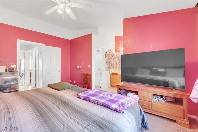 carpeted bedroom with lofted ceiling and ceiling fan