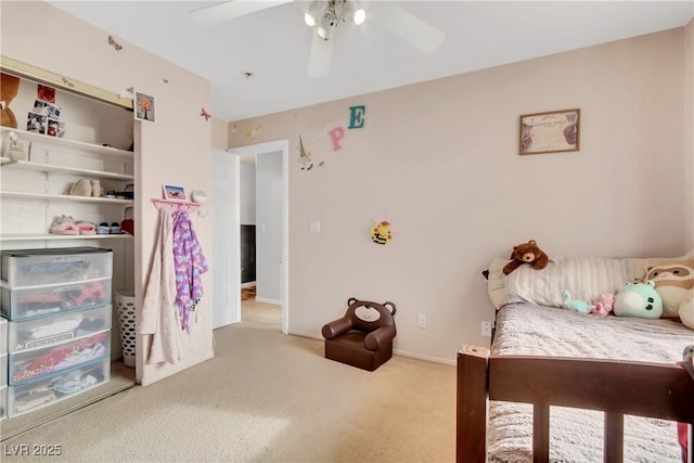 bedroom with light colored carpet and ceiling fan