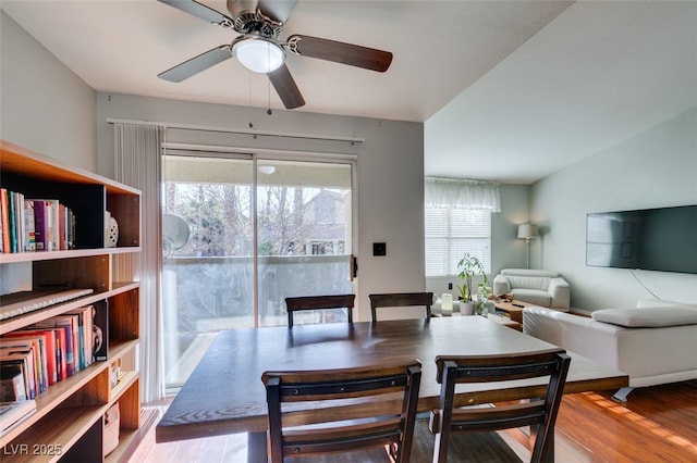 2300 E Silverado Ranch Blvd Unit 2162, Las Vegas, NV 89183 - dining area featuring ceiling fan, lofted ceiling, and wood-type flooring