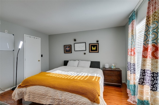 2300 E Silverado Ranch Blvd Unit 2162, Las Vegas, NV 89183 - bedroom featuring wood-type flooring
