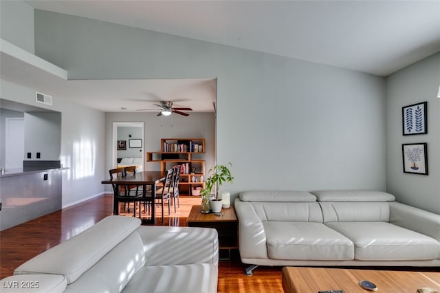 2300 E Silverado Ranch Blvd Unit 2162, Las Vegas, NV 89183 - living room with dark wood-type flooring and ceiling fan