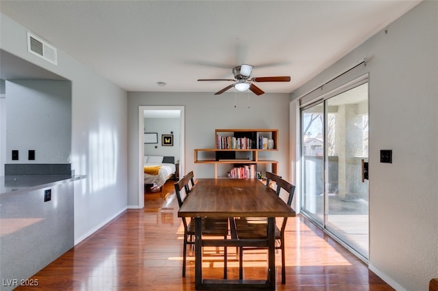 2300 E Silverado Ranch Blvd Unit 2162, Las Vegas, NV 89183 - dining space with hardwood / wood-style floors and ceiling fan