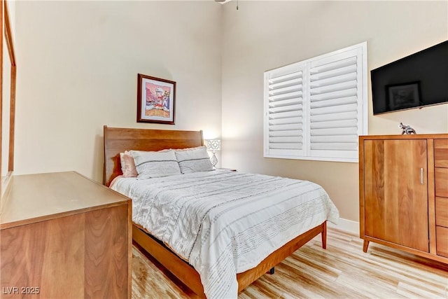 bedroom featuring light hardwood / wood-style flooring