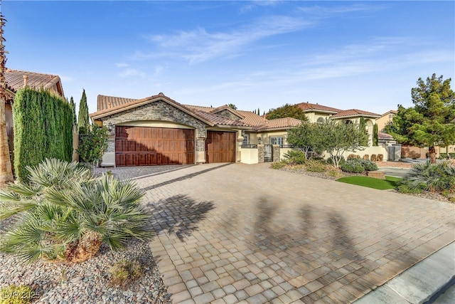 view of front of home with a garage