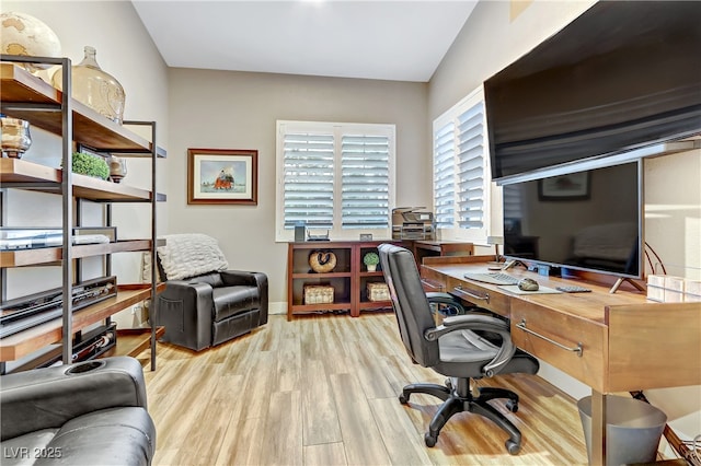 home office featuring light hardwood / wood-style floors