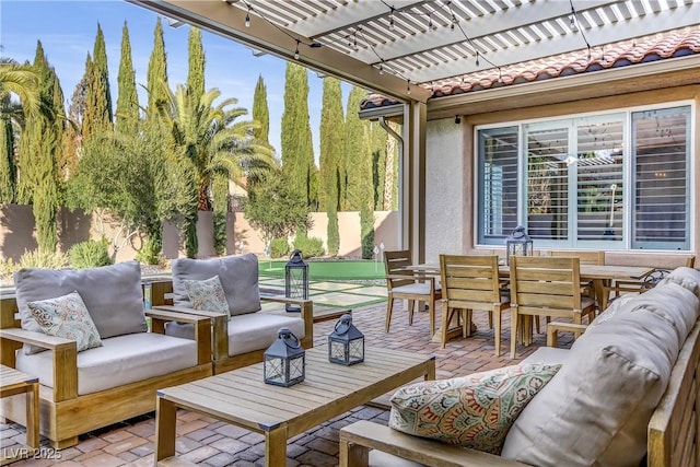 view of patio / terrace with a pergola and an outdoor hangout area