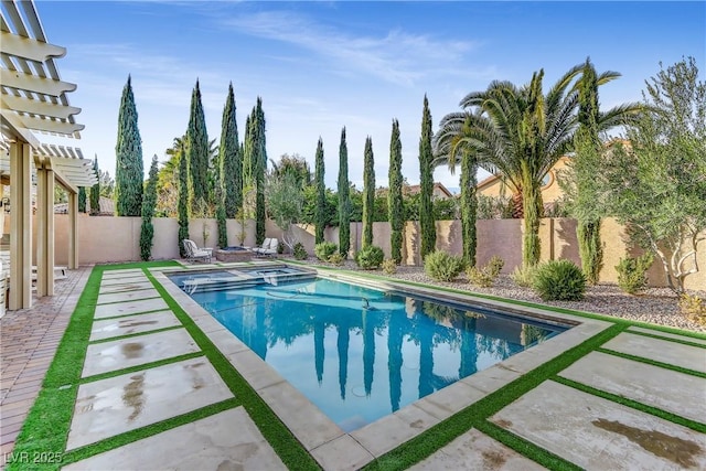 view of swimming pool with a patio area