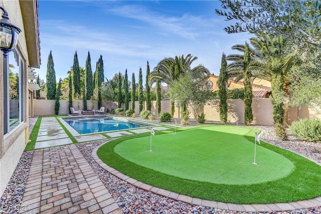 view of swimming pool featuring a patio