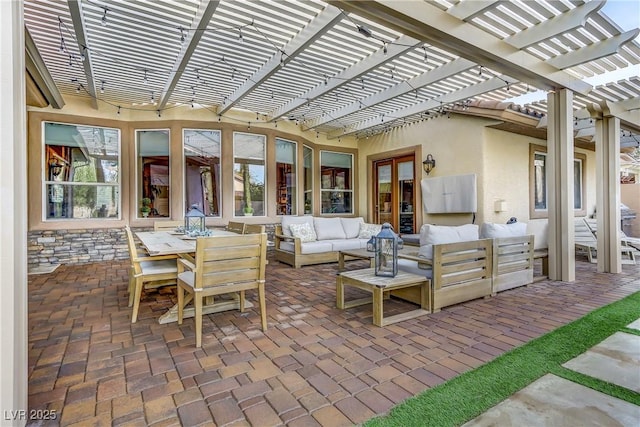 view of patio / terrace with a pergola and an outdoor hangout area