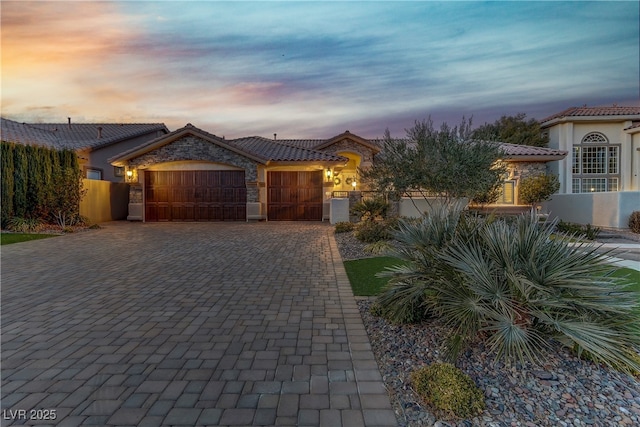 view of front of home with a garage