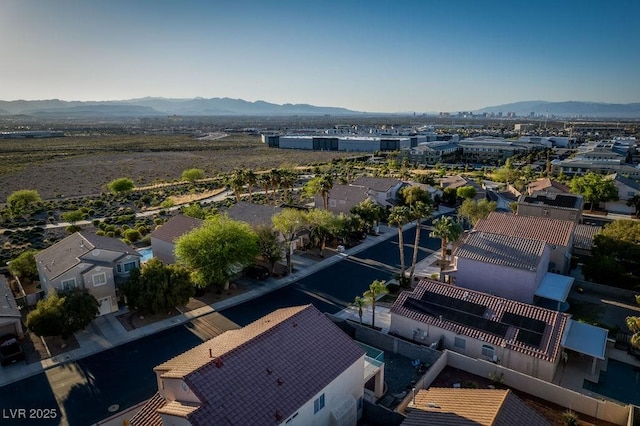 birds eye view of property featuring a mountain view