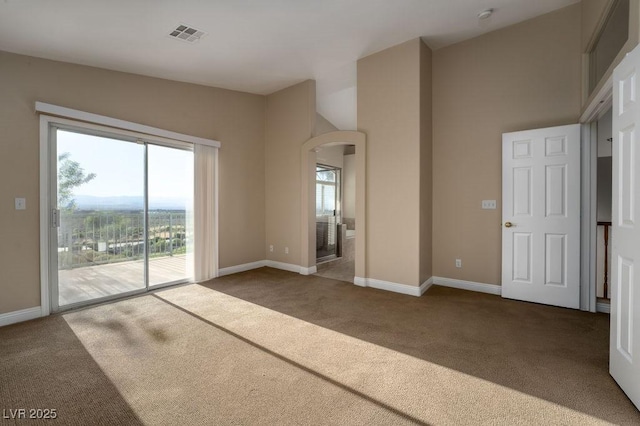 interior space featuring dark colored carpet