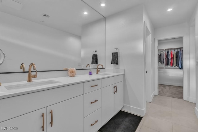 bathroom featuring vanity and tile patterned flooring