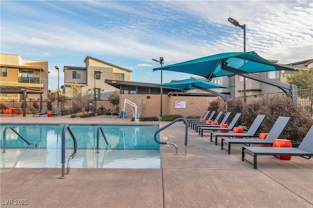 view of pool featuring a patio area