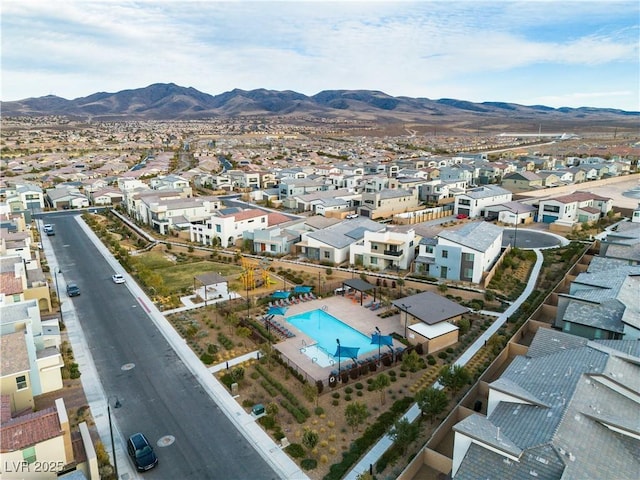 birds eye view of property featuring a mountain view