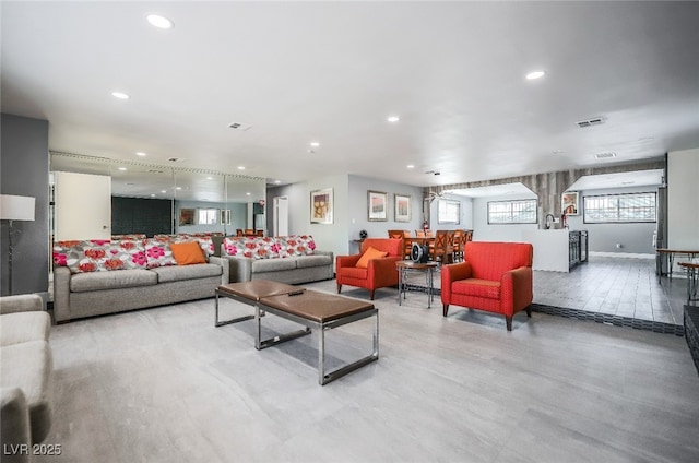 living room with light hardwood / wood-style floors