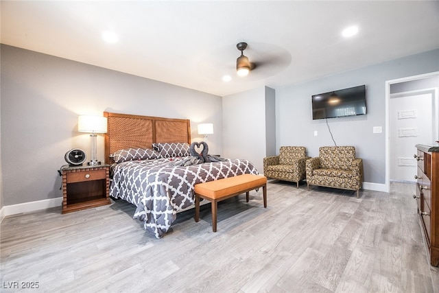 bedroom featuring ceiling fan and light wood-type flooring