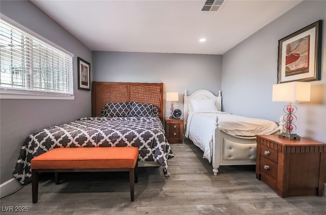 bedroom featuring hardwood / wood-style floors