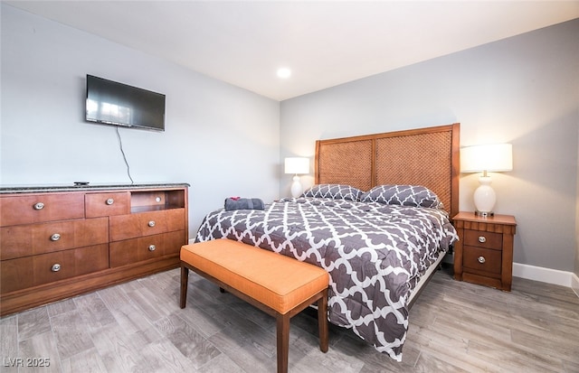 bedroom with light wood-type flooring