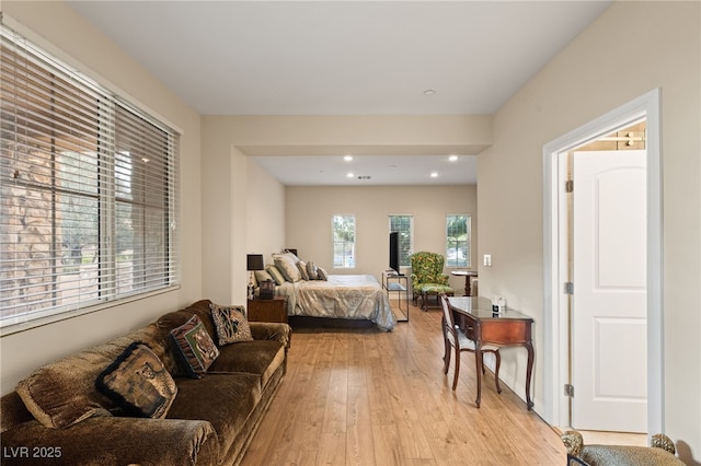 bedroom with light wood-type flooring