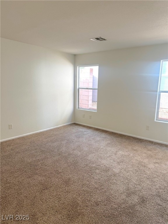 view of carpeted spare room